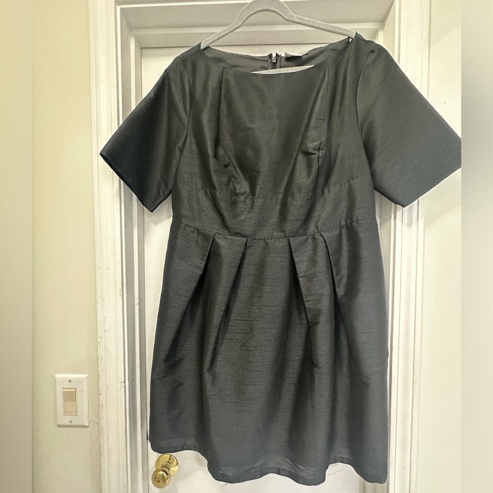 Classic boat neck black dress.